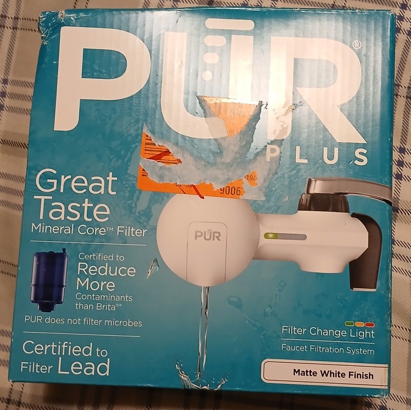 PUR Plus water filter white faucet mount even removes lead and other chemicals.